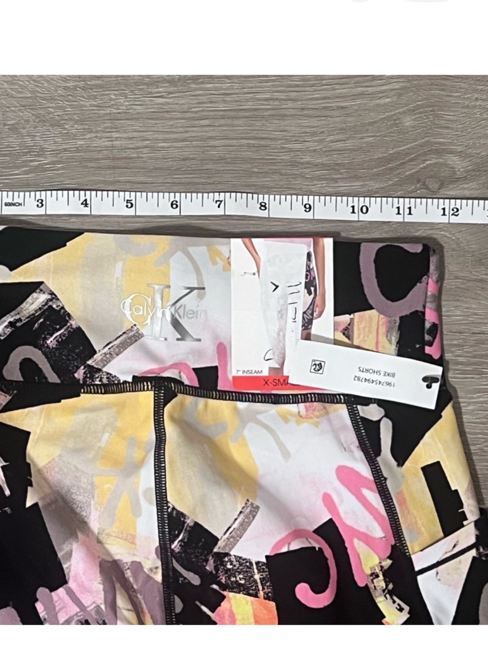Calvin Klein Abstract Print Bike Shorts in Black, Pink, Yellow - Picture 5 of 5